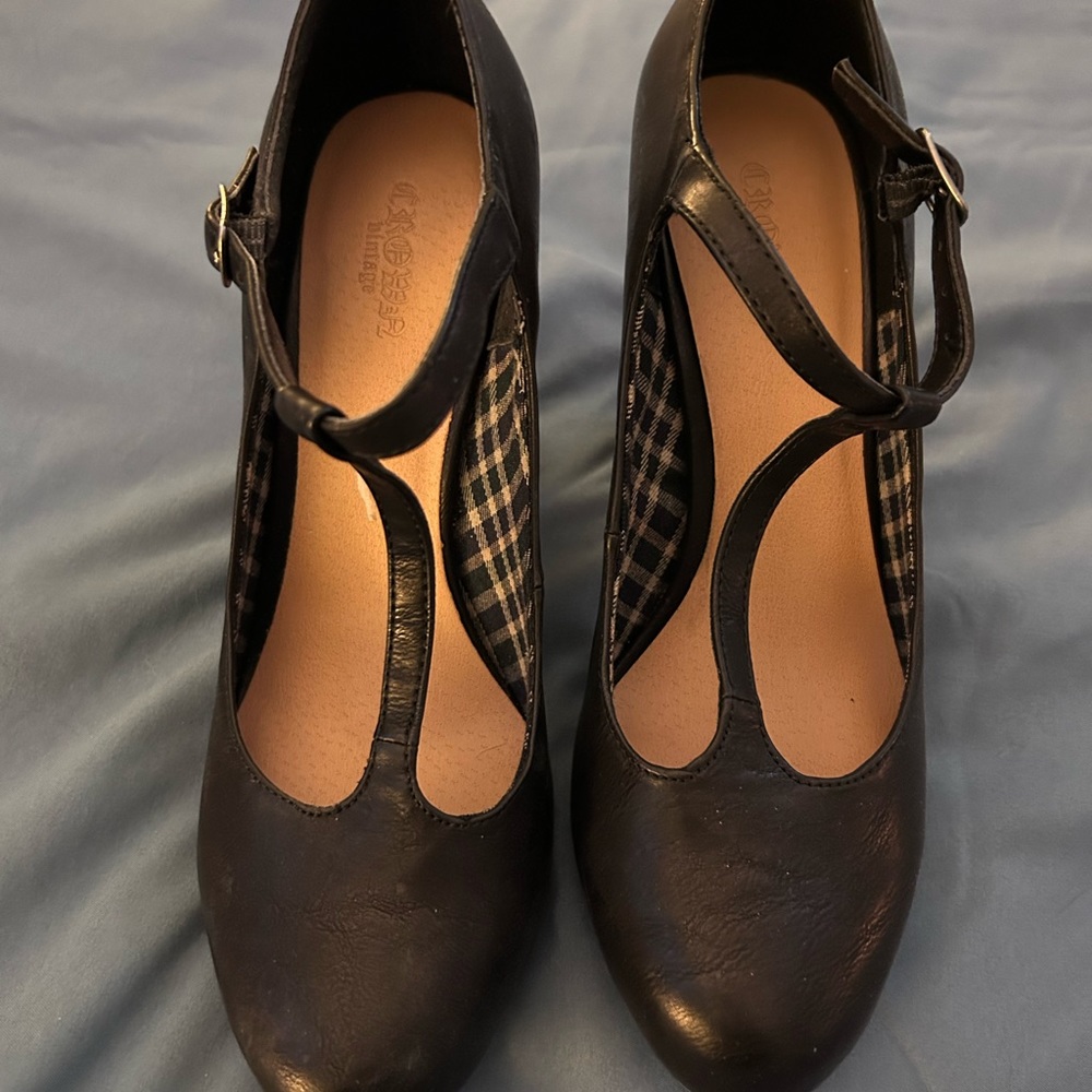 Black leather heels with wood stacked heel